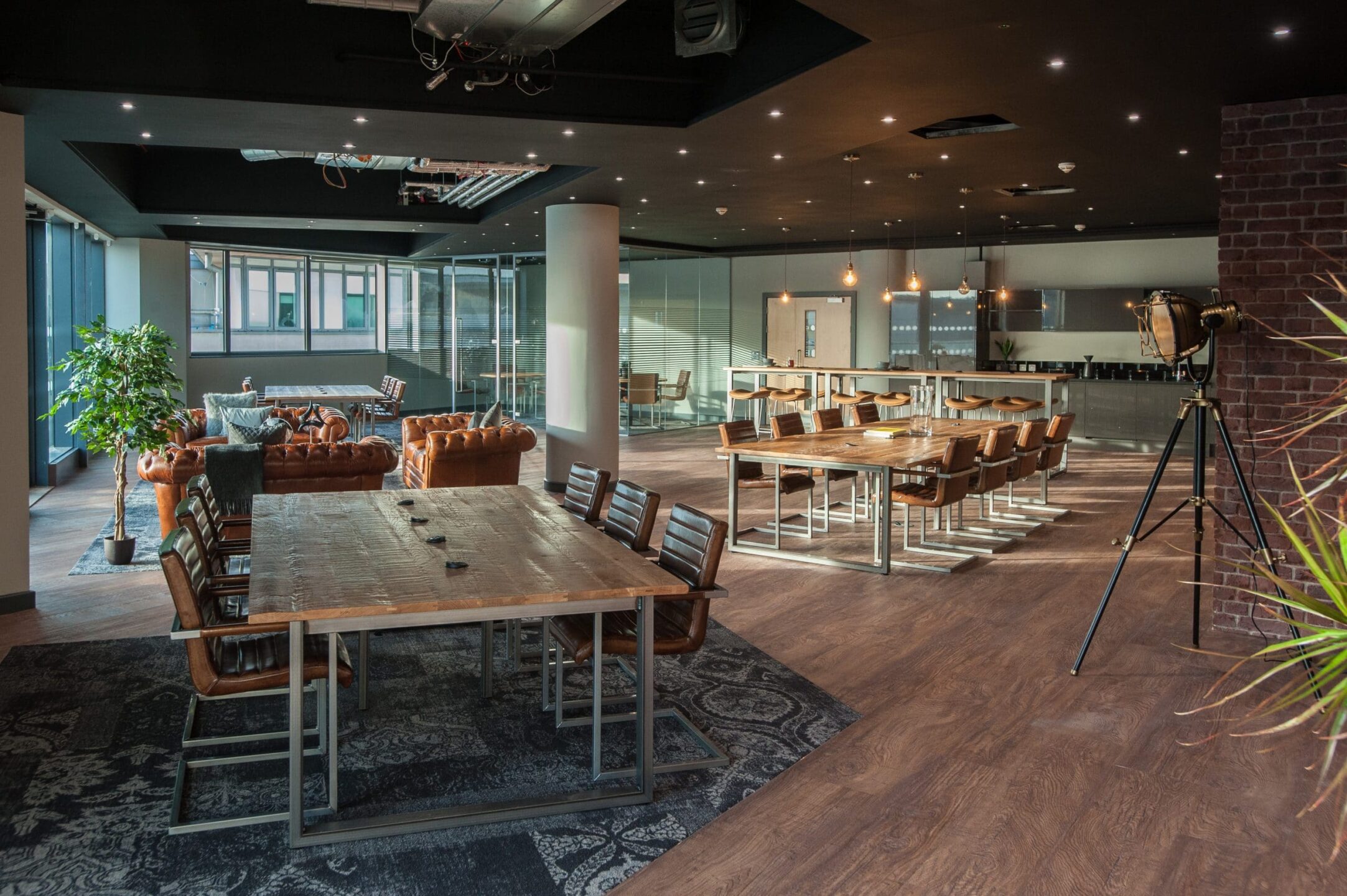 Industrial office design with durable wooden furniture.